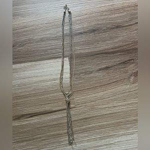 Mixed metal knot necklace